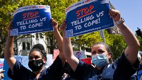 Nurses walk out to protest low pay, pandemic workload (VIDEOS)