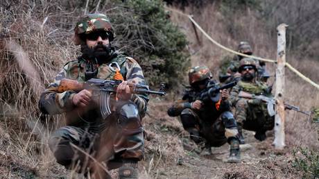 FILE PHOTO: Indian army soldiers patrol as they keep vigil at a forward post on the Line of Control (LoC) in Keran Kupwara, Jammu and Kashmir, India.