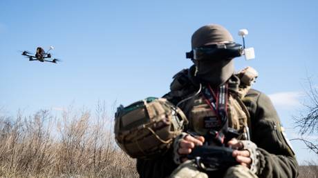 FILE PHOTO: A Ukrainian soldier testing an FPV drone, March 19, 2025.