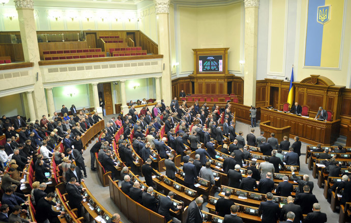Deputies of the Ukrainian parliament vote for a constitution change in Kiev on February 21, 2014.(AFP Photo / Genya Savilov )